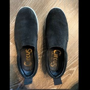 Black platform sneakers